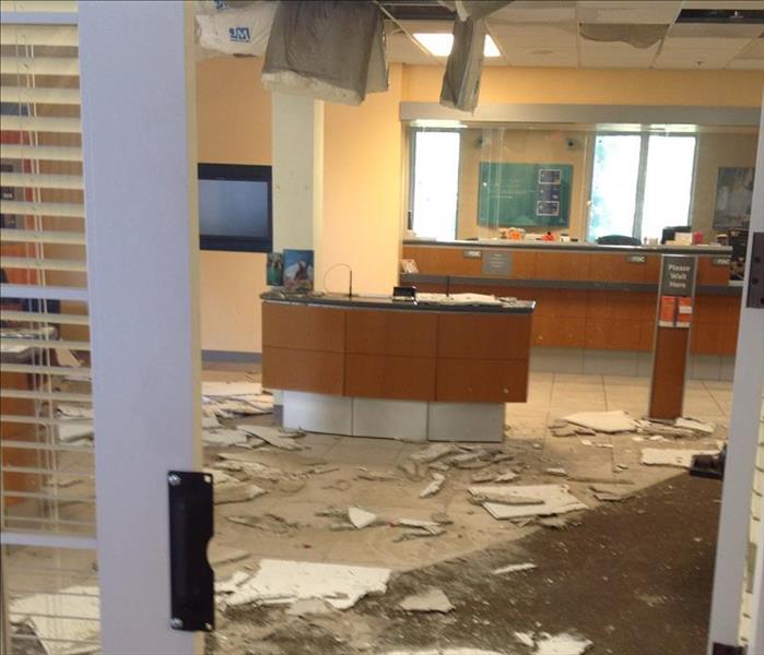 inside of bank lobby, littered with debris
