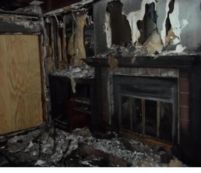  fire damage in homeowners living room