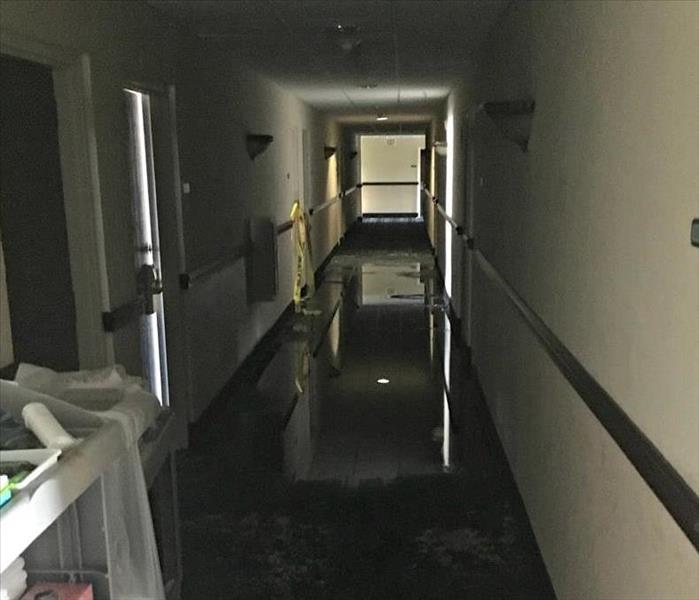 flooded hotel hallway