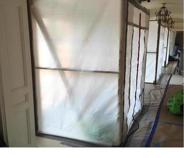 Mold containment area set up in a homeowners living room
